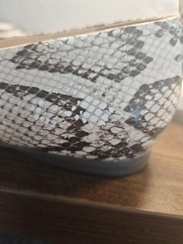 Customer photo for "Not a comfortable fit and peeling"