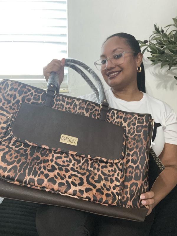 Customer photo for "Stunning leopard print weekender bag stylish, spacious, and super durable"