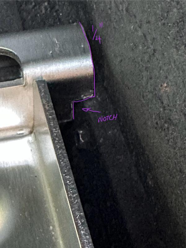 Cut 1/4” of each side of rear spacer and notch with a hacksaw