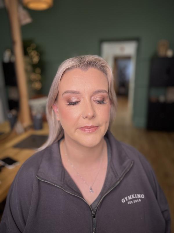 Client with Nars Lipstick applied