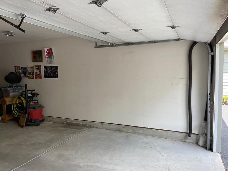 2. Wall after removing the old shelving.