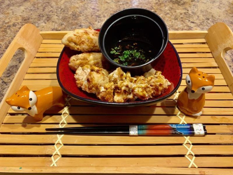 Plated air fried Alligator tail and Chicken Wings