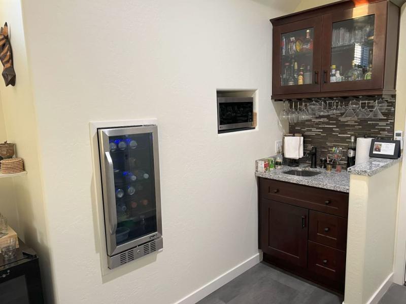 Built into the wall which had several feet of dead space behind it.