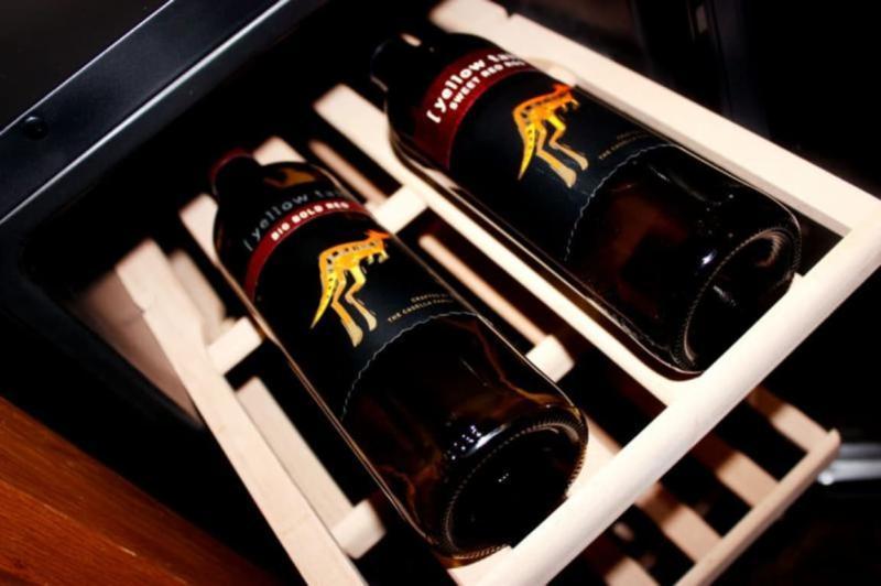 The wooden shelves are sturdy and modern looking.