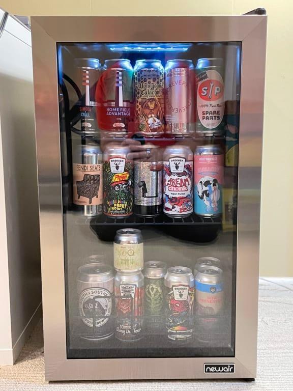 Fridge with light on and full of goodies!