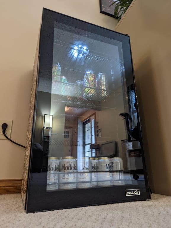 Taller than you would expect for a mini fridge.