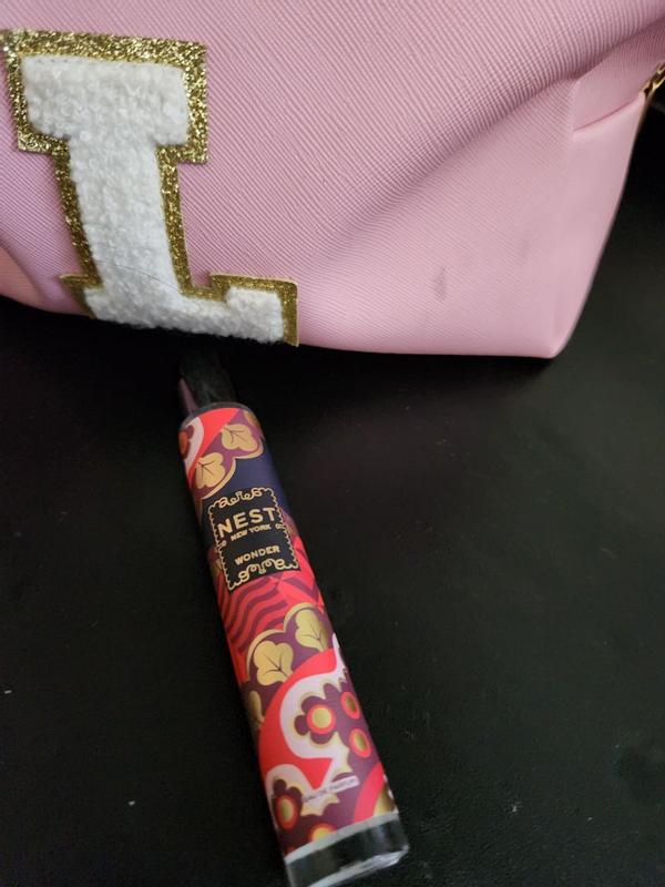 Customer photo for "The scent is very strong in the beginning, but it does last!"