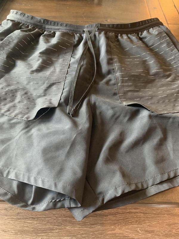 Showing busted pockets on all 3 pairs of shorts