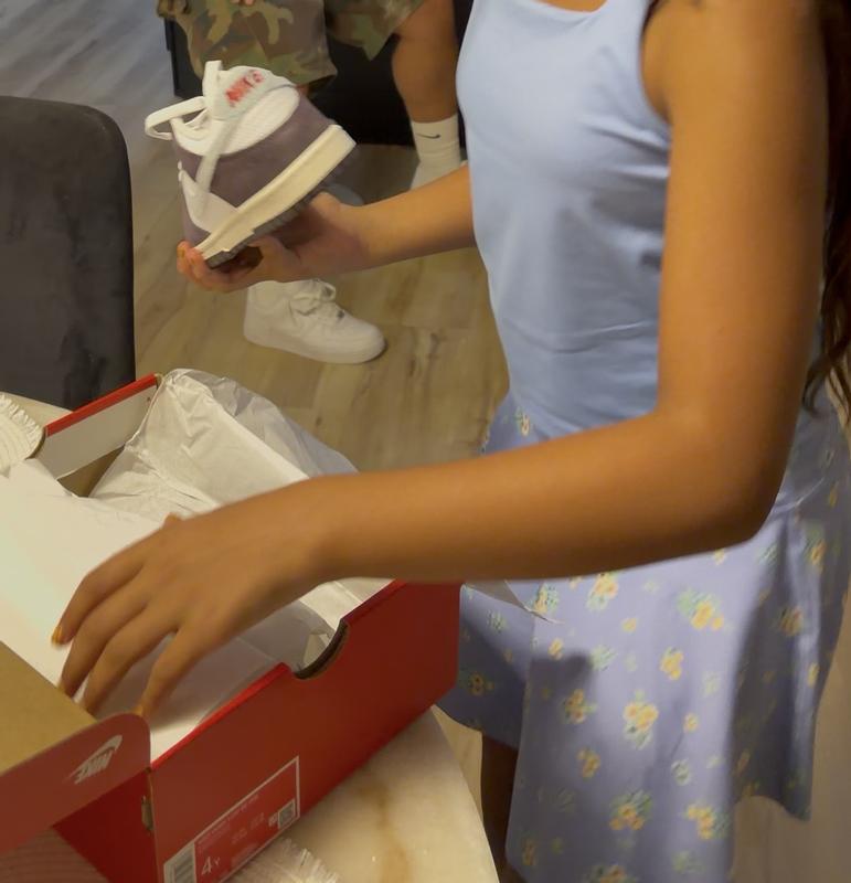 Customer photo for "Nikes for kids"
