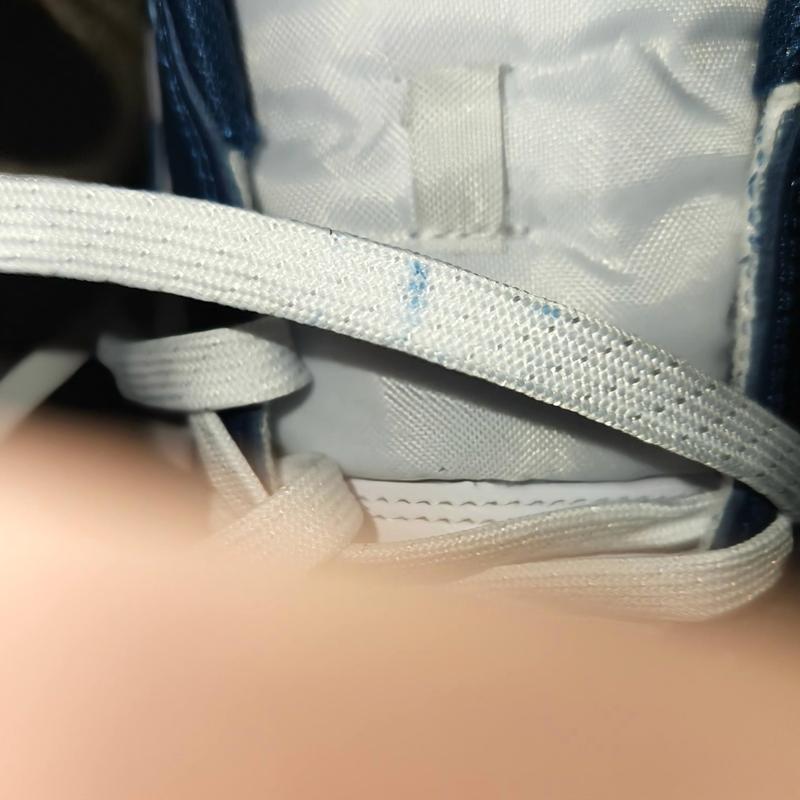 Blue stains & dirt on the shoelaces. I've only unlaced factory style & relaced criss cross 1 time.