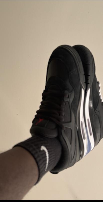 Customer photo for "Wasn’t expecting much, but these surprised me! They look like Jordan 4 Black Cats and feel amazing. Honestly, better than Black Cats! 🔥 11/10"