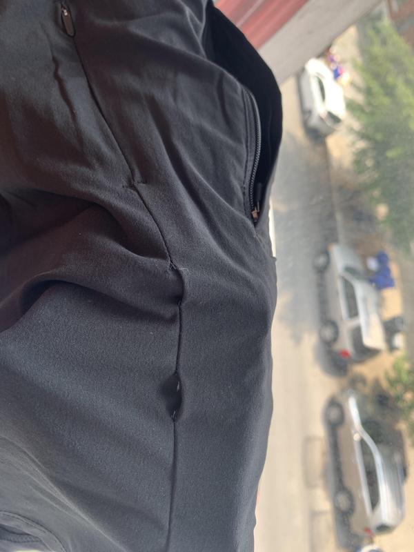 Rip under right pocket