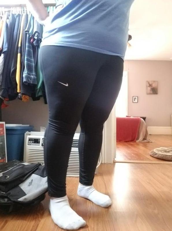 Nike Women's Dri-FIT Mid-Rise leggings in royal - Depop