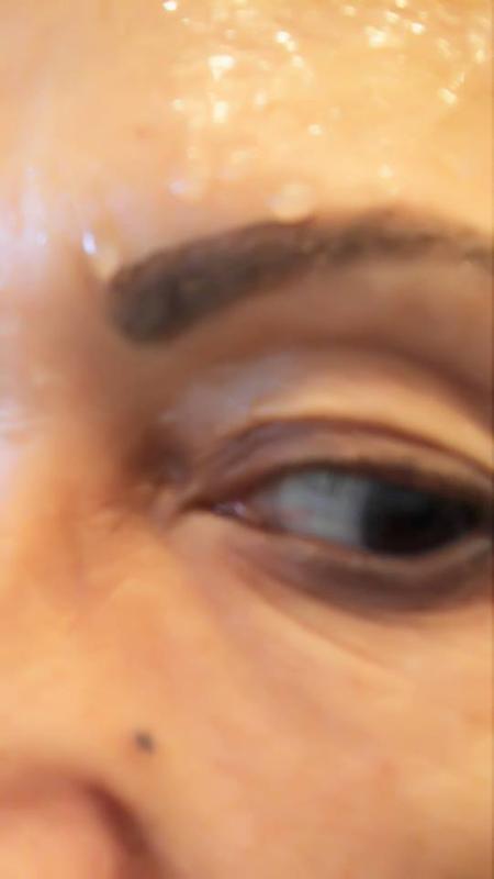 Eyebrow splashed with water