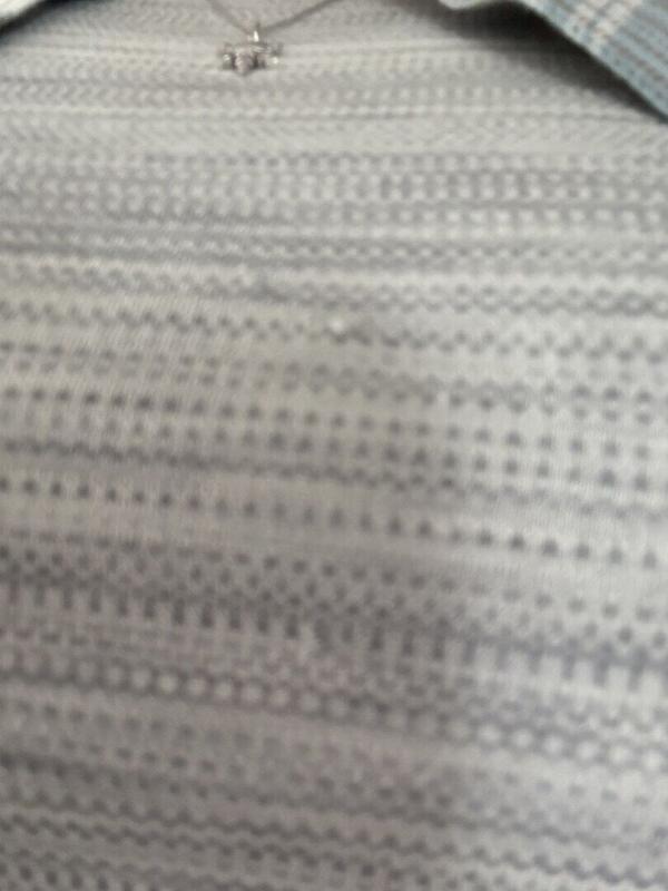 Customer photo for "I love smartwool but this top has snags in the front."