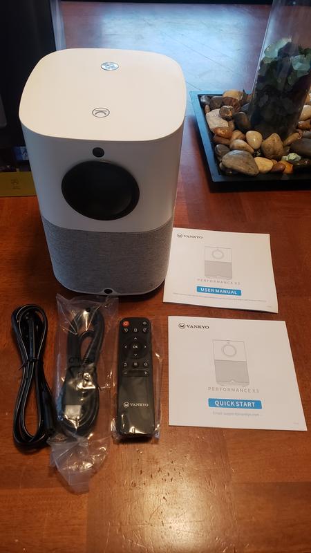 Actual projector and what came with it. (No batteries for remote)