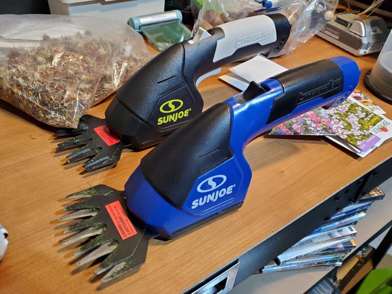 My Sunjoe grass shears/hedgers. The old one in front, the new one behind.