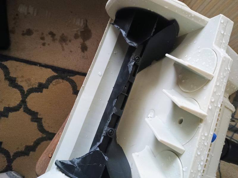 Broken paddles on auger