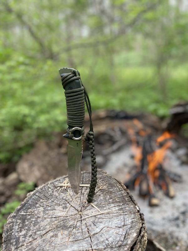 The wrap around the grip is purely for aesthetic and utility in this picture. The grip is excellent without augmentation.