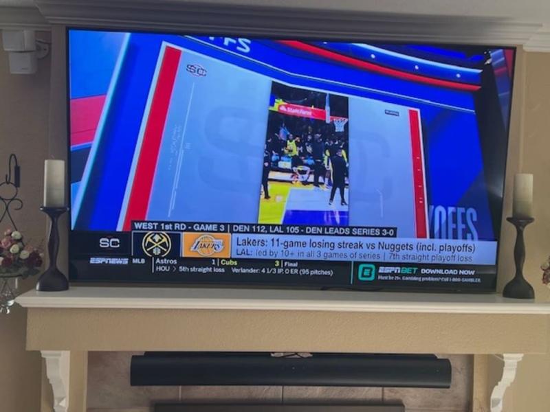 Soundbar mounted under mantle