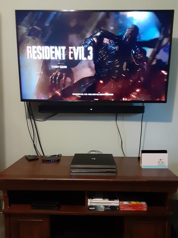 Soundbar right below TV (please note the tiny LED light in the center of it that reads "TV")