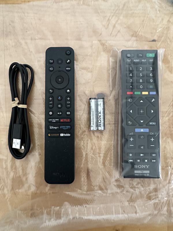 USB C styles remote on the LEFT / Traditional battery powered remote on the RIGHT