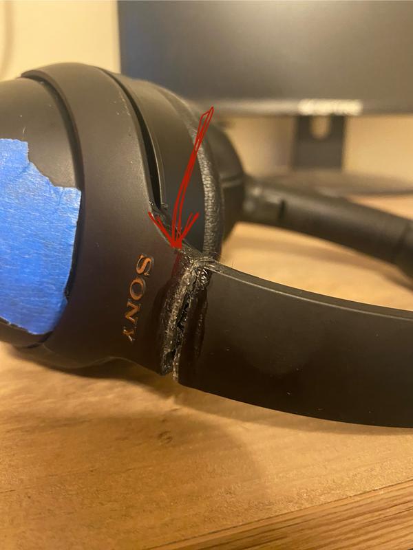 The plastic piece is now glued in so can’t take it out but it’s just inside the headphone where the arrow is pointing