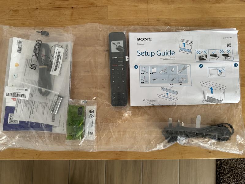 Everything in the box (including the 2 remotes and 2 metal stands)