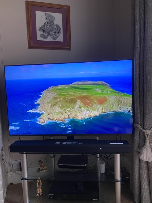 Home living room TV where we watch and now listen to truly excellent special sound from such an low profile fine electronic equipment