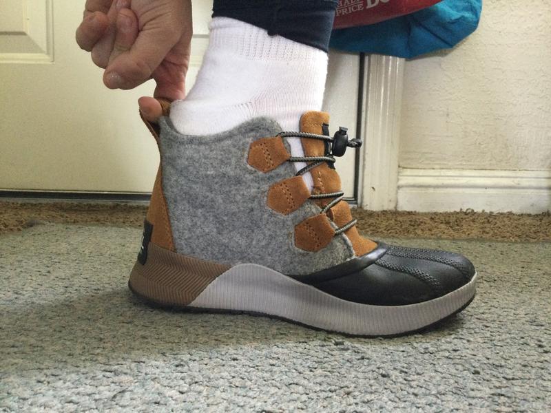 Pulling the back collar, thus far, is required! I never needed to do this with Sorel boots/shoes before but not an issue for me.