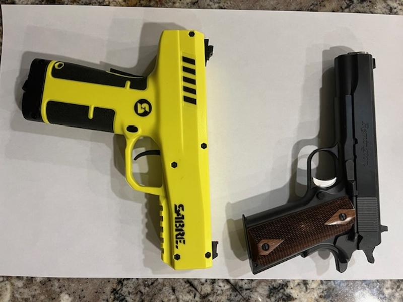 1911 and pepper launcher comparison