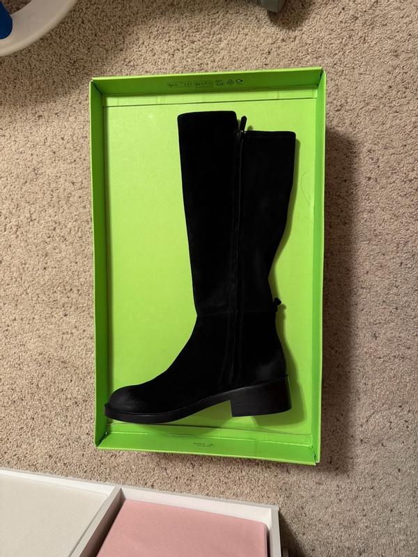 Customer photo for "Barely fits a wide calf"