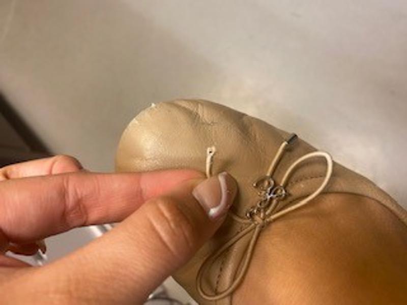 Metal piece came off on right shoe