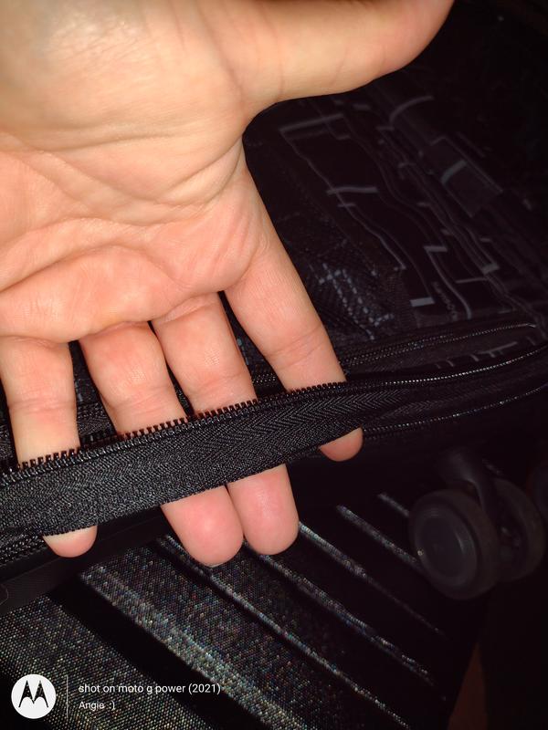 Took 2 pics, hard to see since I have the black set.  Seam for the upper is completely undone and luggage is unusable   :(