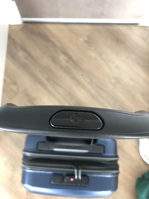 Push button on top to release handle