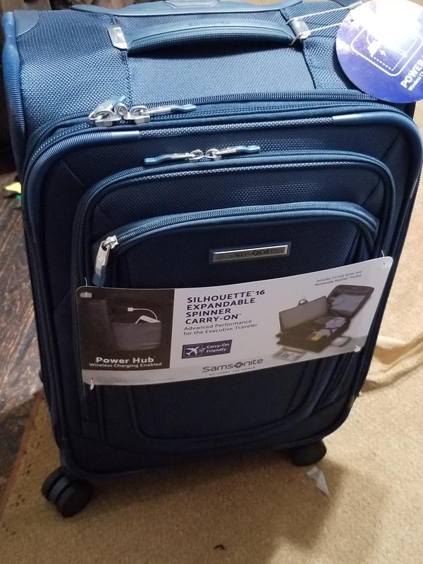 Spinner carry on suitcase