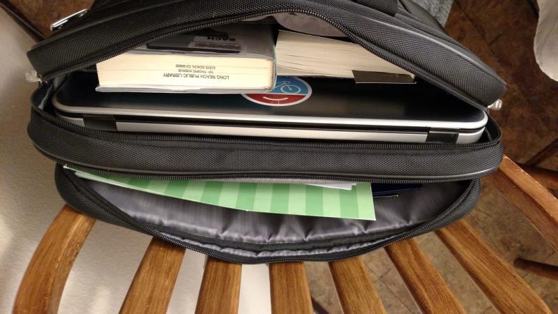 Books, folders, 17' laptop