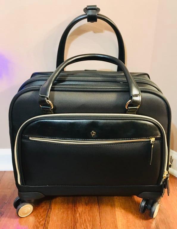 Compatible with most laptops up to 15.6", A dedicated padded laptop compartment offers protection against damage. Includes two accessory pockets.