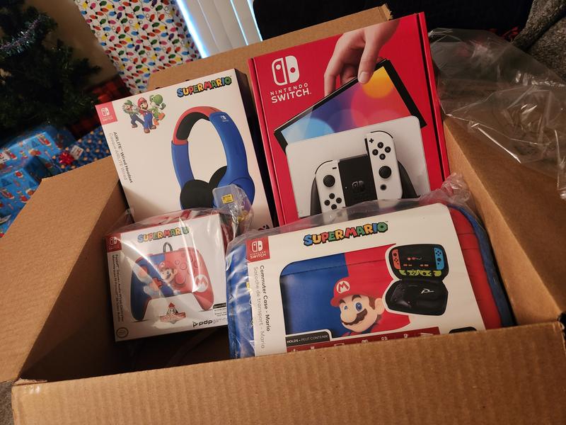 Wario64 on X: a Super Smash Bros. Ultimate - Switch OLED bundle spotted  with digital copy of the game, 3 months of Switch Online membership, and  Joy-con themed Smash controllers / X