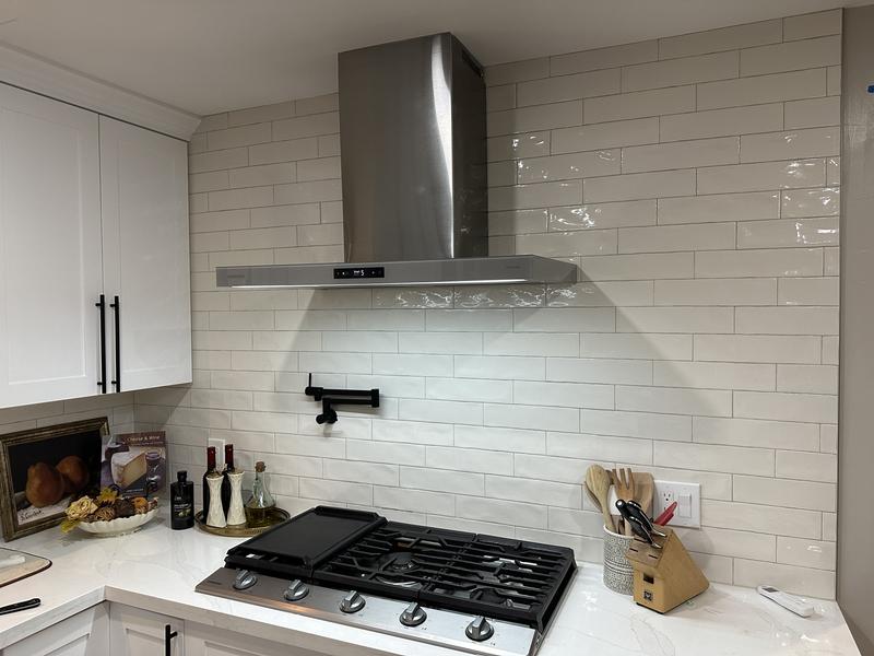 Install your range hood and wall mount vent