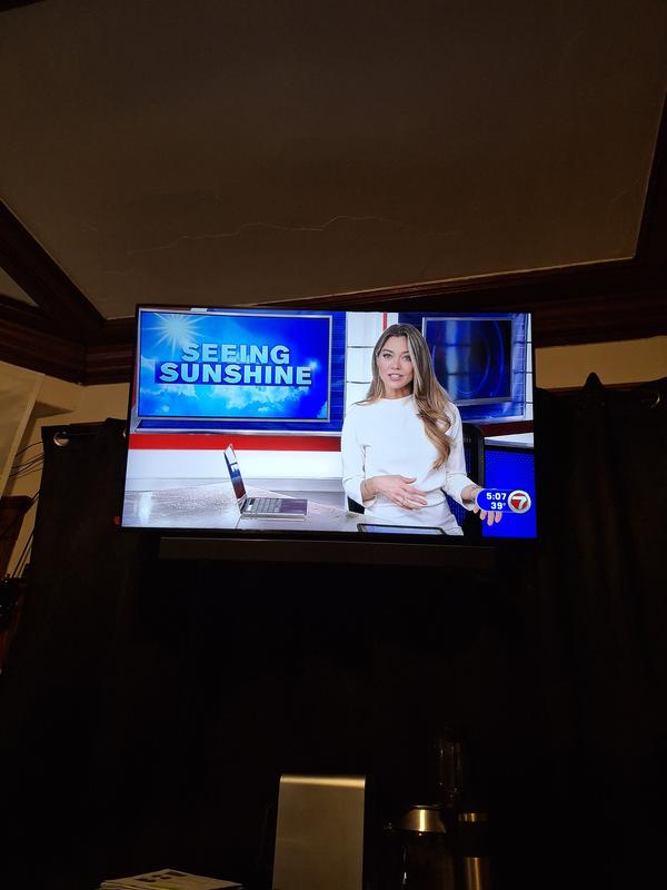 Wall mount with sound bar.