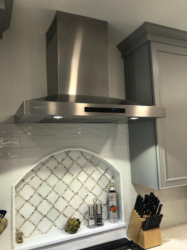 Install your range hood and wall mount vent