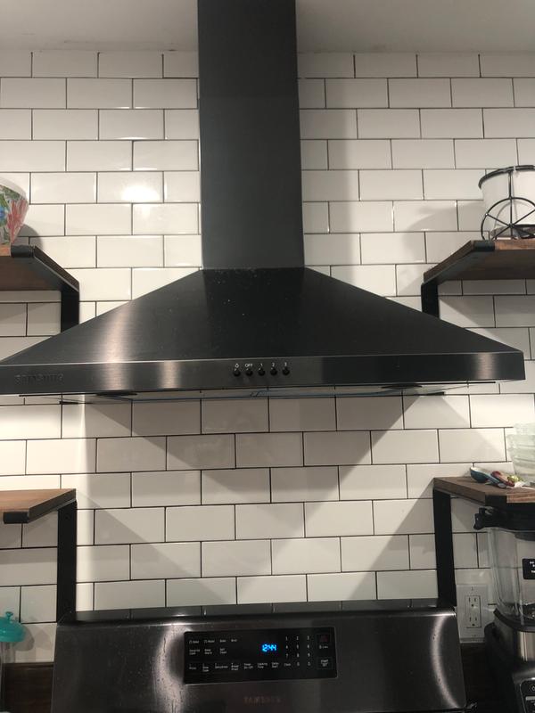 Install your range hood and wall mount vent