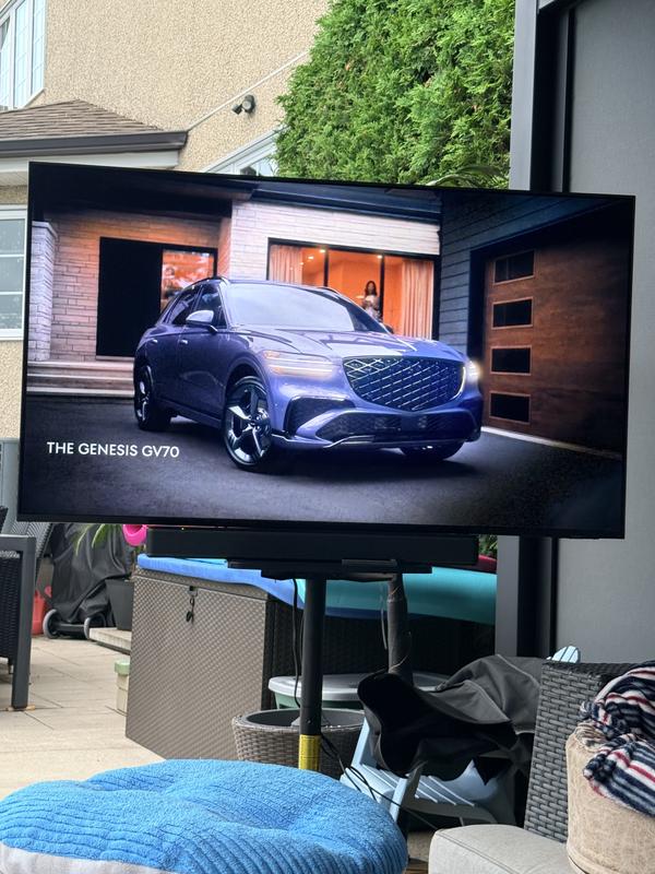 Using outside on tv stand, very light weight tv to move around