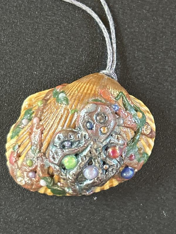 Octopus on sea shell with original sculpey and liquid sculpey.