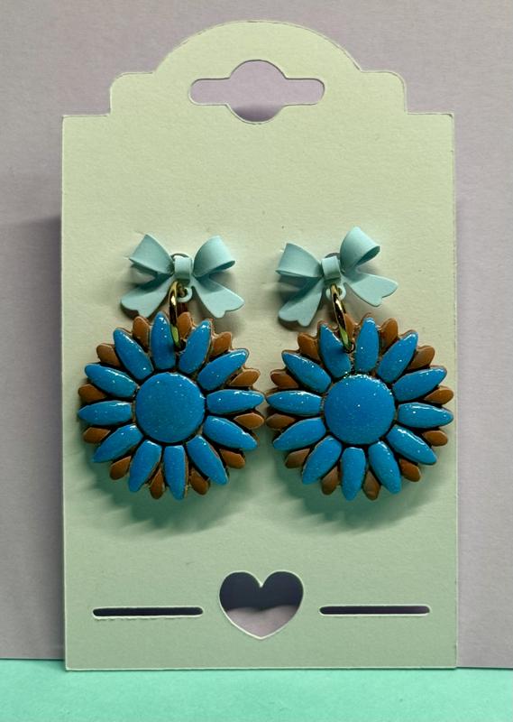 Made with Sculpey oven baked terra cotta clay