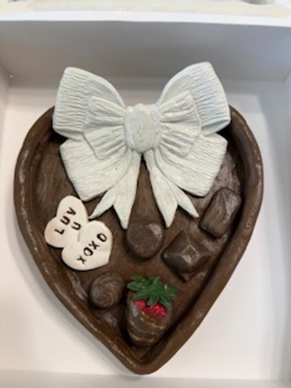 "Chocolate box" with candies used for charity silent auction