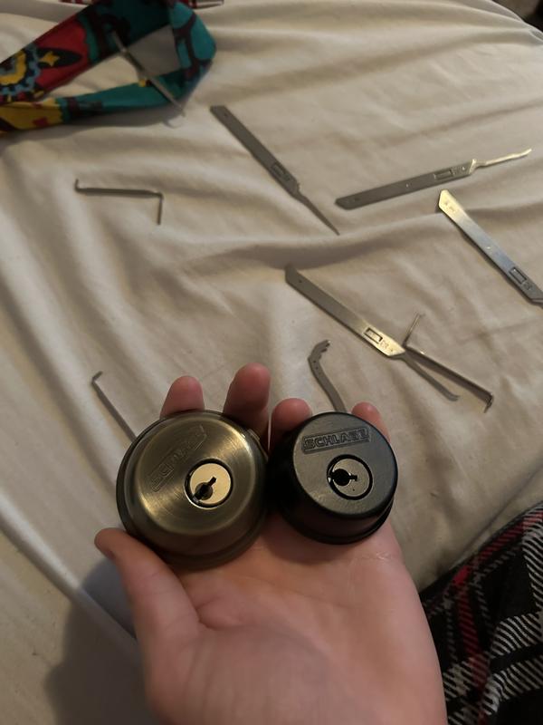 both locks opened, keyway is in an open position without a key as proof of picking.