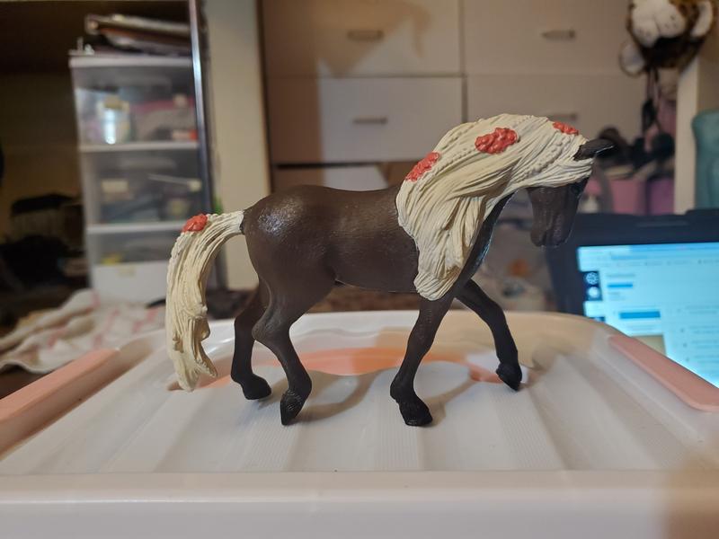 One side of her. Her paint job is bit shiny, but the flowers are not too bad.