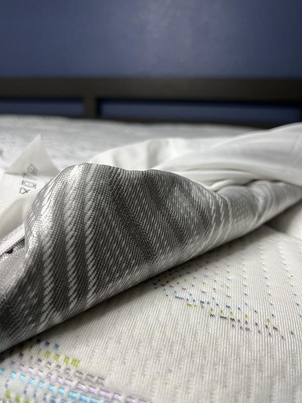 Underneath the mattress pad